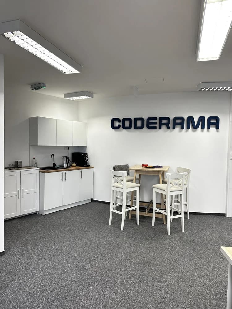 The Coderama logo on the office wall